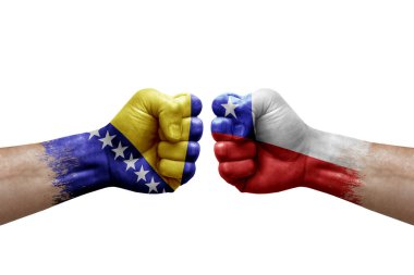 Two hands punch to each others on white background. Country flags painted fists, conflict crisis concept between bosnia and chile