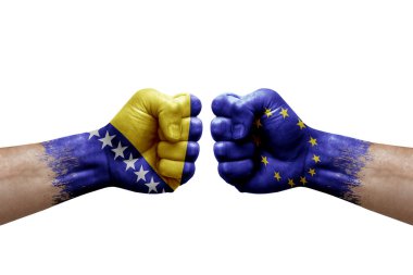 Two hands punch to each others on white background. Country flags painted fists, conflict crisis concept between bosnia and european union