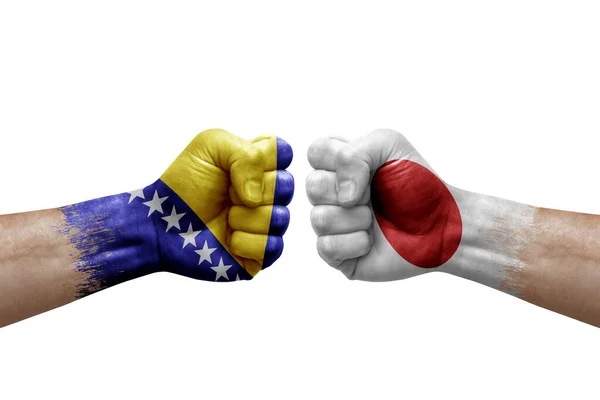 Two Hands Punch Each Others White Background Country Flags Painted — Stockfoto