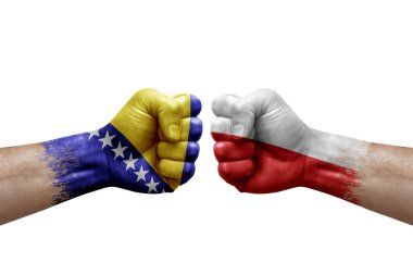 Two hands punch to each others on white background. Country flags painted fists, conflict crisis concept between bosnia and poland