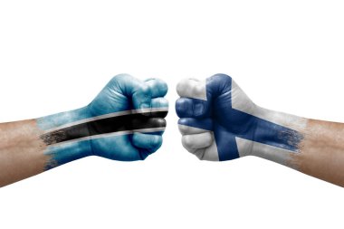 Two hands punch to each others on white background. Country flags painted fists, conflict crisis concept between botswana and finland