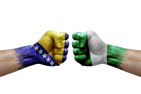 Two Hands Punch Each Others White Background Country Flags Painted — Stock Photo, Image