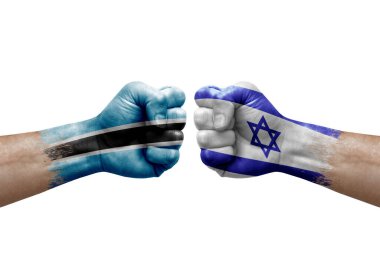 Two hands punch to each others on white background. Country flags painted fists, conflict crisis concept between botswana and israel