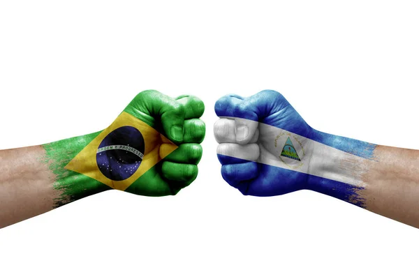 Two Hands Punch Each Others White Background Country Flags Painted — Fotografia de Stock