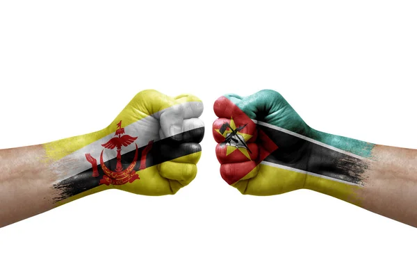 Two Hands Punch Each Others White Background Country Flags Painted — Stok fotoğraf