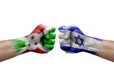 Two hands punch to each others on white background. Country flags painted fists, conflict crisis concept between burundi and israel