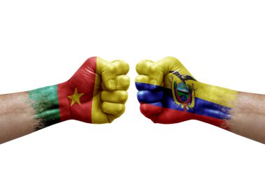 Two hands punch to each others on white background. Country flags painted fists, conflict crisis concept between cameroon and ecuador