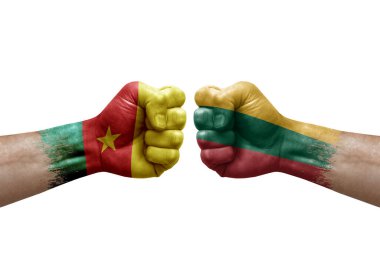 Two hands punch to each others on white background. Country flags painted fists, conflict crisis concept between cameroon and lithuania