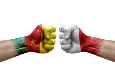 Two hands punch to each others on white background. Country flags painted fists, conflict crisis concept between cameroon and malta