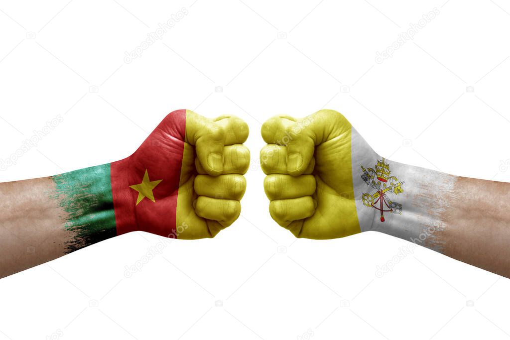 Two hands punch to each others on white background. Country flags painted fists, conflict crisis concept between cameroon and holy see