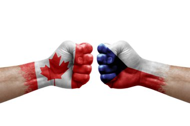 Two hands punch to each others on white background. Country flags painted fists, conflict crisis concept between canada and czechia
