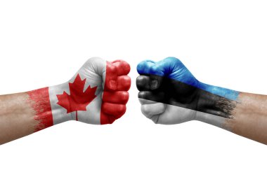 Two hands punch to each others on white background. Country flags painted fists, conflict crisis concept between canada and estonia