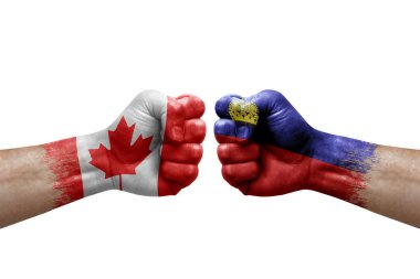 Two hands punch to each others on white background. Country flags painted fists, conflict crisis concept between canada and liechtenstein