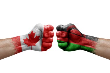 Two hands punch to each others on white background. Country flags painted fists, conflict crisis concept between canada and malawi
