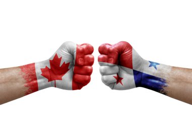 Two hands punch to each others on white background. Country flags painted fists, conflict crisis concept between canada and panama