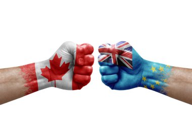 Two hands punch to each others on white background. Country flags painted fists, conflict crisis concept between canada and tuvalu