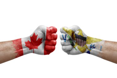 Two hands punch to each others on white background. Country flags painted fists, conflict crisis concept between canada and virgin islands