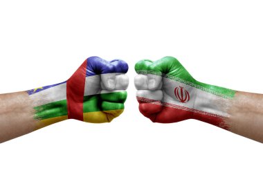 Two hands punch to each others on white background. Country flags painted fists, conflict crisis concept between central african republic and iran