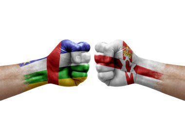 Two hands punch to each others on white background. Country flags painted fists, conflict crisis concept between central african republic and ireland