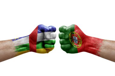 Two hands punch to each others on white background. Country flags painted fists, conflict crisis concept between central african republic and portugal