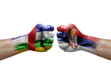 Two hands punch to each others on white background. Country flags painted fists, conflict crisis concept between central african republic and serbia