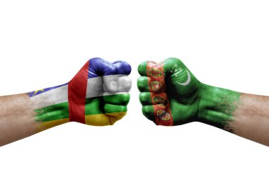 Two hands punch to each others on white background. Country flags painted fists, conflict crisis concept between central african republic and turkmenistan