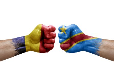 Two hands punch to each others on white background. Country flags painted fists, conflict crisis concept between chad and dr congo