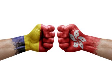 Two hands punch to each others on white background. Country flags painted fists, conflict crisis concept between chad and hong kong