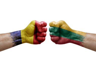 Two hands punch to each others on white background. Country flags painted fists, conflict crisis concept between chad and lithuania