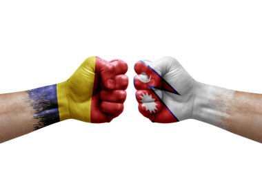 Two hands punch to each others on white background. Country flags painted fists, conflict crisis concept between chad and nepal
