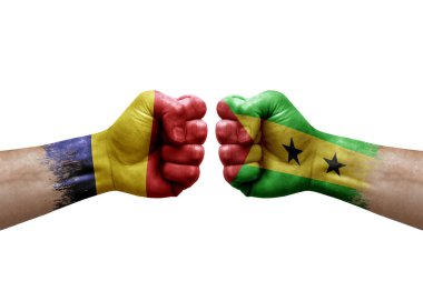 Two hands punch to each others on white background. Country flags painted fists, conflict crisis concept between chad and sao tome and principe