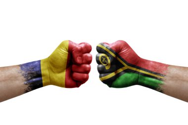 Two hands punch to each others on white background. Country flags painted fists, conflict crisis concept between chad and vanuatu