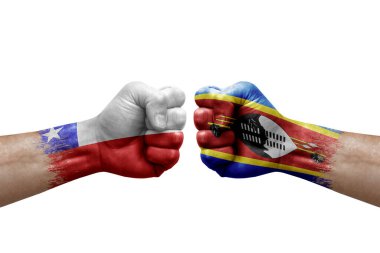 Two hands punch to each others on white background. Country flags painted fists, conflict crisis concept between chile and eswatini