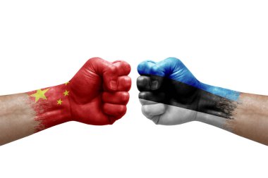 Two hands punch to each others on white background. Country flags painted fists, conflict crisis concept between china and estonia