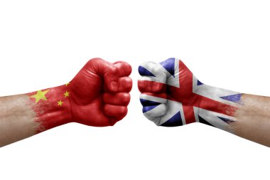 Two hands punch to each others on white background. Country flags painted fists, conflict crisis concept between china and britain