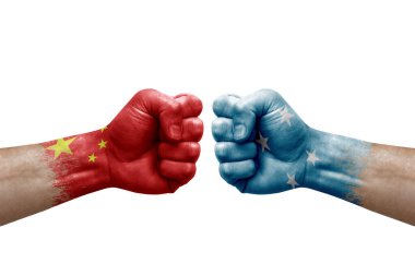 Two hands punch to each others on white background. Country flags painted fists, conflict crisis concept between china and micronesia