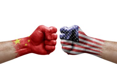 Two hands punch to each others on white background. Country flags painted fists, conflict crisis concept between china and usa