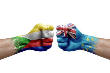 Two hands punch to each others on white background. Country flags painted fists, conflict crisis concept between comoros and tuvalu