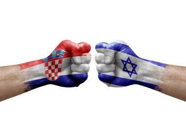 Two hands punch to each others on white background. Country flags painted fists, conflict crisis concept between croatia and israel