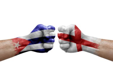 Two hands punch to each others on white background. Country flags painted fists, conflict crisis concept between cuba and england