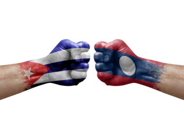 Two hands punch to each others on white background. Country flags painted fists, conflict crisis concept between cuba and laos