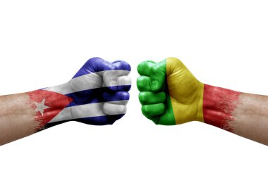 Two hands punch to each others on white background. Country flags painted fists, conflict crisis concept between cuba and mali