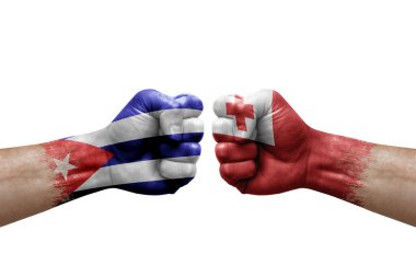 Two hands punch to each others on white background. Country flags painted fists, conflict crisis concept between cuba and tonga
