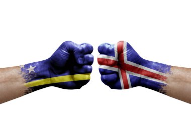 Two hands punch to each others on white background. Country flags painted fists, conflict crisis concept between curacao and iceland