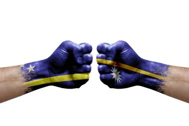 Two hands punch to each others on white background. Country flags painted fists, conflict crisis concept between curacao and nauru