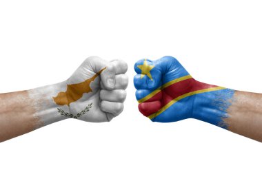 Two hands punch to each others on white background. Country flags painted fists, conflict crisis concept between cyprus and dr congo