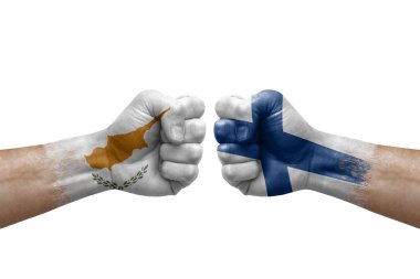 Two hands punch to each others on white background. Country flags painted fists, conflict crisis concept between cyprus and finland