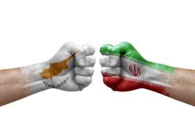 Two hands punch to each others on white background. Country flags painted fists, conflict crisis concept between cyprus and iran