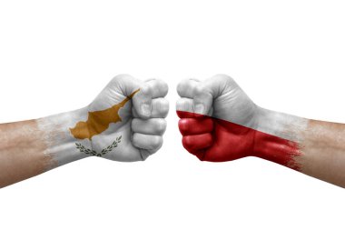 Two hands punch to each others on white background. Country flags painted fists, conflict crisis concept between cyprus and poland