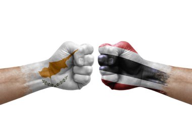 Two hands punch to each others on white background. Country flags painted fists, conflict crisis concept between cyprus and thailand